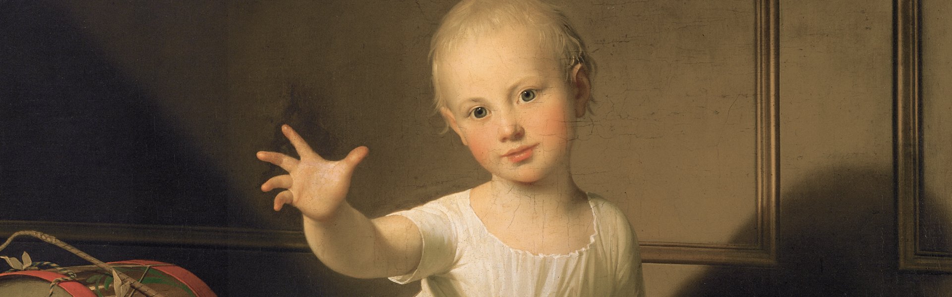 Maleriet „Hertug Friedrich Emil August von Schleswig-Holstein-Sonderborg-Augustenburg, gen. Prinz von Noer“ af Jens Juel viser en lille dreng. Han er klædt i en hvid kappe og rækker hånden ud mod betragteren. Ved siden af ham ligger legetøj (en tromme og en træhest).