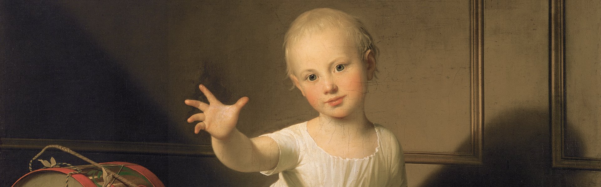 Maleriet „Hertug Friedrich Emil August von Schleswig-Holstein-Sonderborg-Augustenburg, gen. Prinz von Noer“ af Jens Juel viser en lille dreng. Han er klædt i en hvid kappe og rækker hånden ud mod betragteren. Ved siden af ham ligger legetøj (en tromme og en træhest).